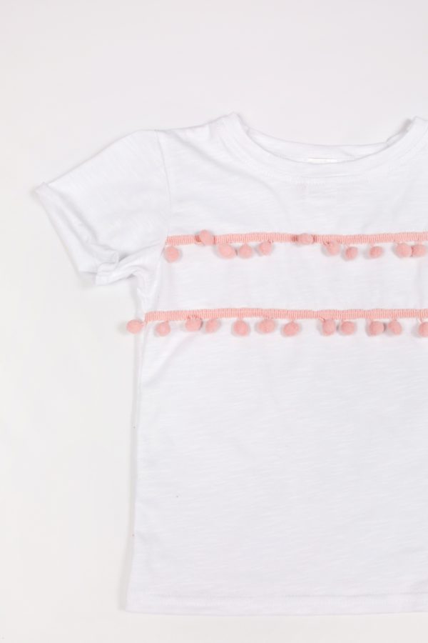 Купить ребенку белую футболку с розовыми бубонами в Украине